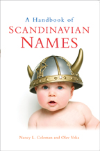 A portrait of a baby wearing a horned viking hat