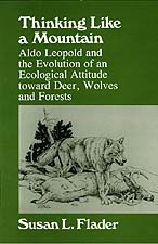 cover of Thinking Like a Mountain is a deep forest green. A drawing of a wolf standing over a deer is featured.