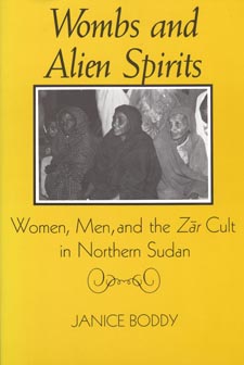 Cover image is yellow with a black and white image of spirits.