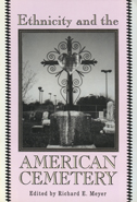 Book cover is light purple, white, and black.  There is a photo of a grave in the center.