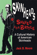Book cover is black and green, with red and white type and a skinhead on the left.