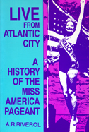 Cover of book is blue and purple with Miss America in a bathing suit.  An American flag is behind her.