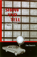 Cover of Show and Tell is photo of grid and model car and globe.