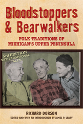 the cover of Bloodstoppers and Bearwalkers is cream colored, with posterized grainy photo of three older men, and some block style type.