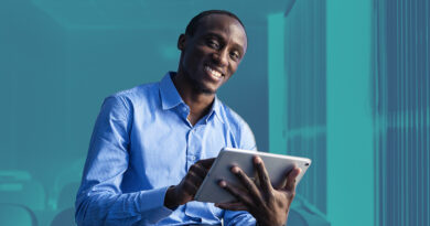 Kenyan man with tablet